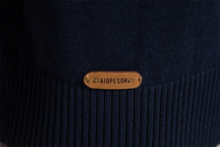 Versatile men's colorblock half-zip sweater, perfect for layering in fall and winter.