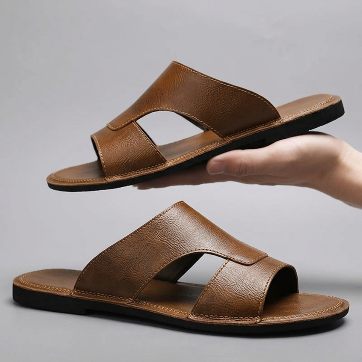 Durable men's cross-strap slip-on sandals, great comfort footwear for beach, pool, and warm weather.