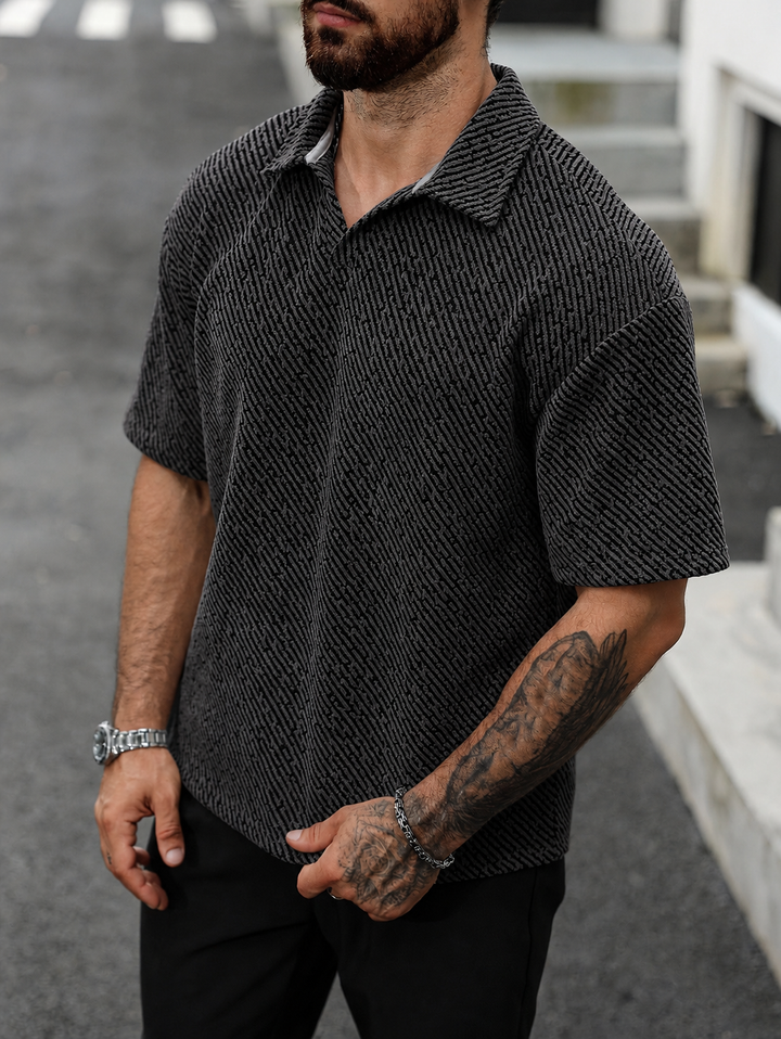 Comfortable men's textured Monaco polo, relaxed fit, short sleeve, stylish open collar, great for warm weather.
