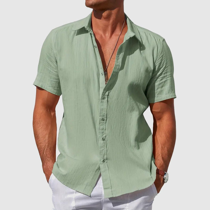 Breathable textured men's short sleeve top, great for summer comfort & relaxed style.
