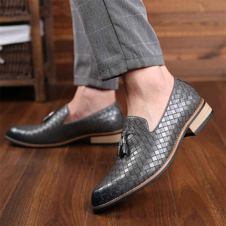 Men's elegant woven tassel loafers, showcasing superior craftsmanship and sleek design.