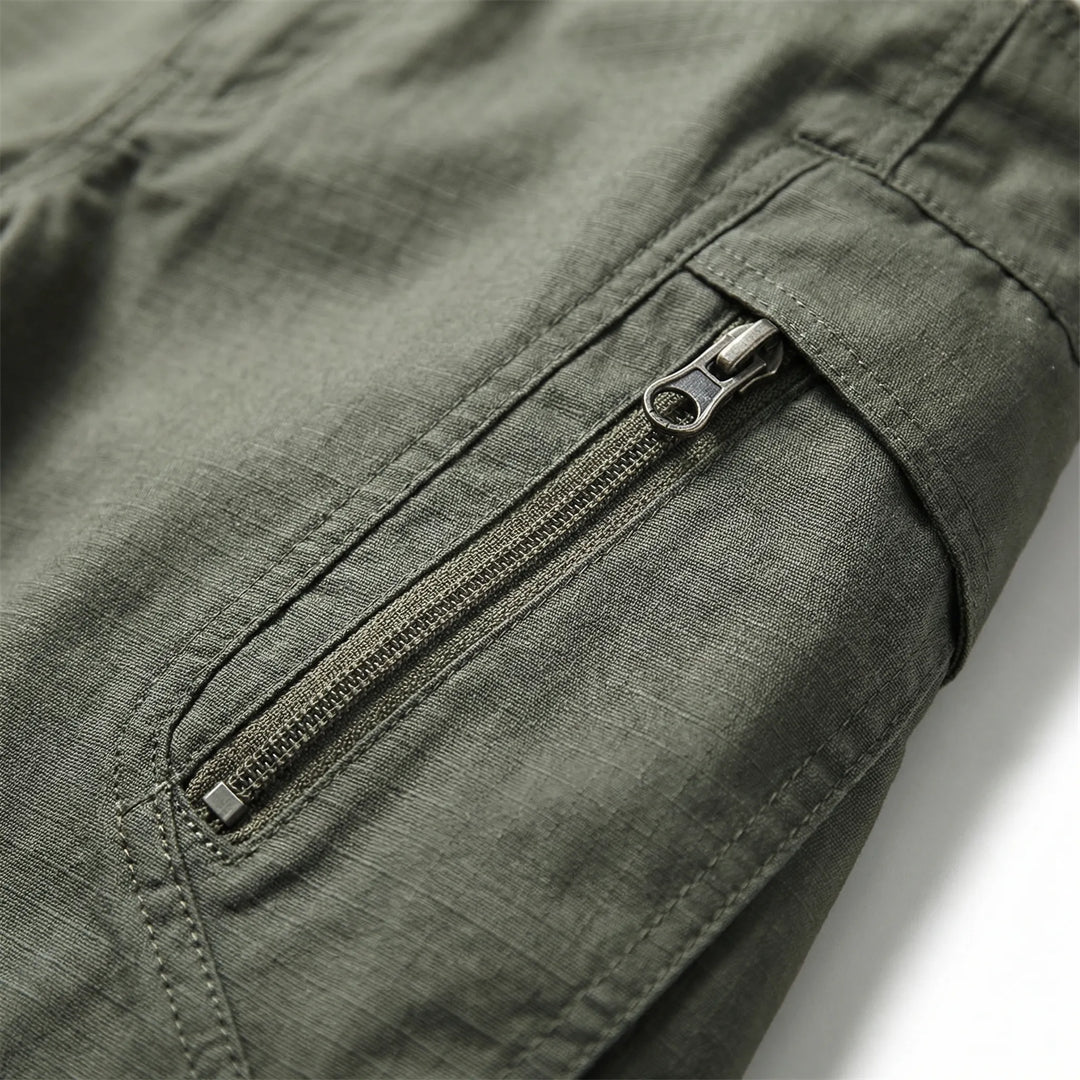 Comfort fit men's tactical pants, 9 utility pockets. Durable outdoor wear for hiking, work, and daily adventure.
