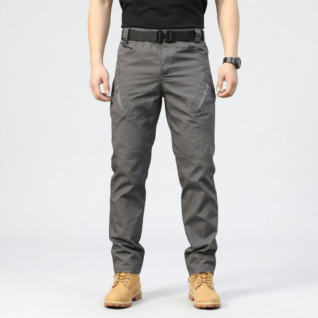 Side view of men's tactical cargo pants, showing 9 functional pockets. Excellent adventure gear for outdoor use.