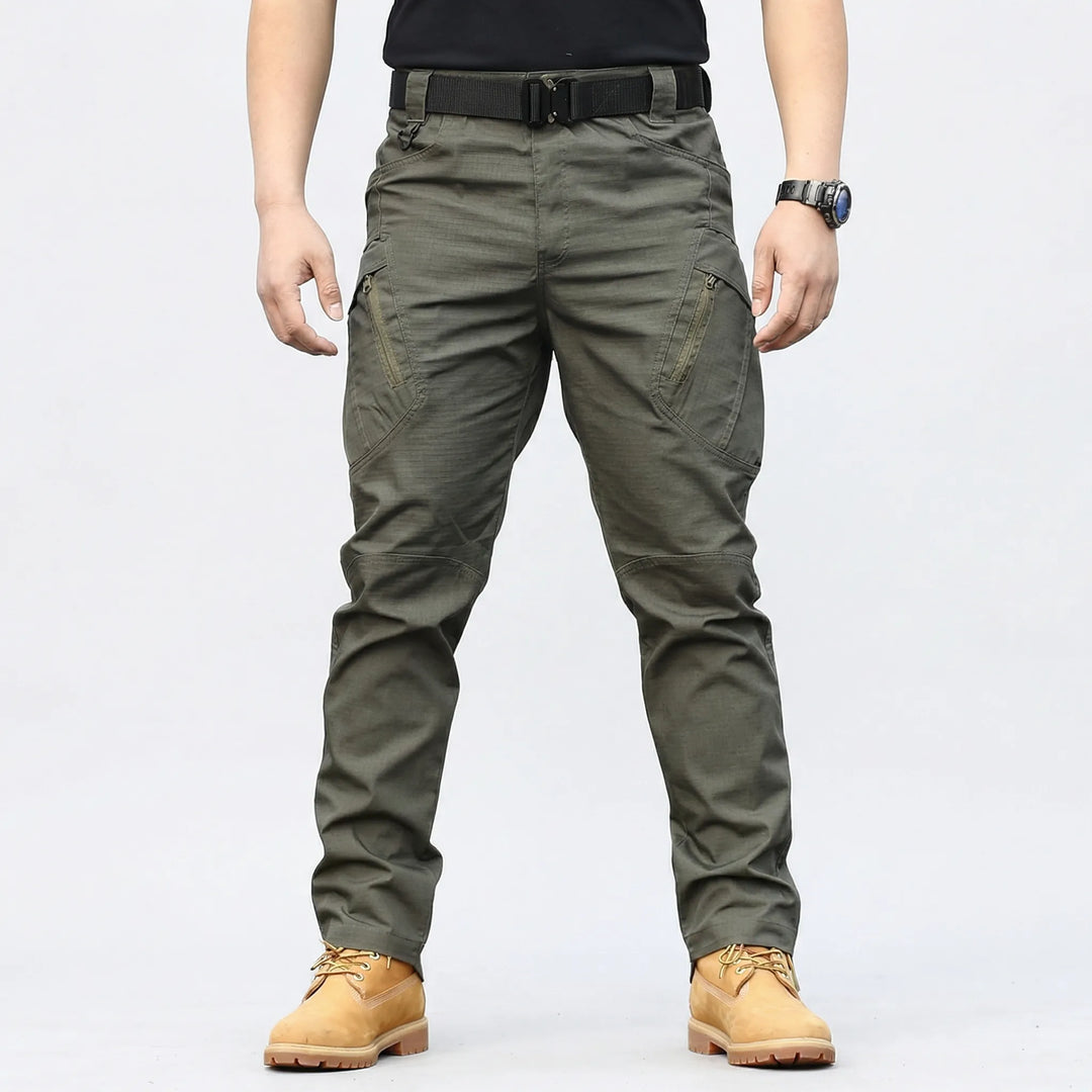 Weather-resistant men's tactical cargo pants with 9 pockets, providing comfort and durability for any outdoor challenge.