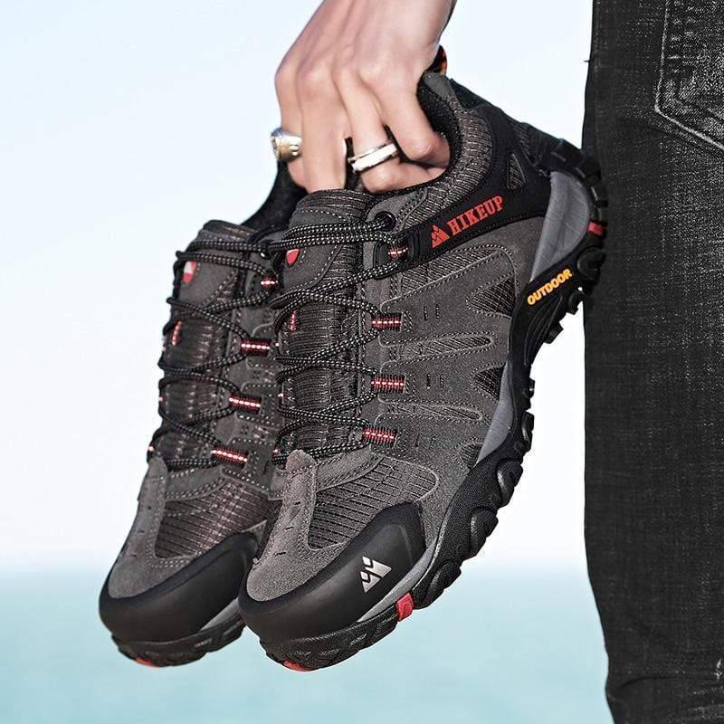 Close-up of men's athletic tactical sneakers with suede leather and sturdy sole for trekking