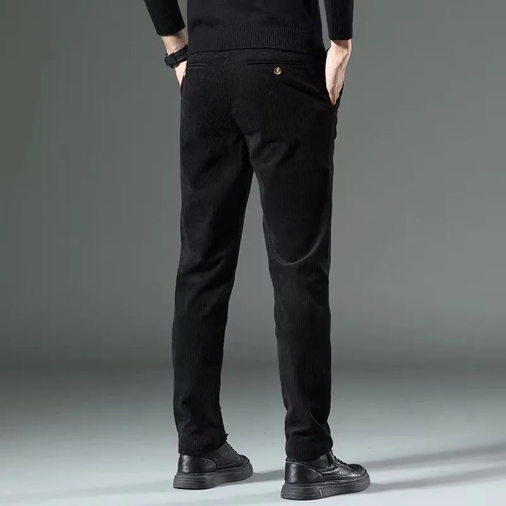 Sleek black men's tailored comfort dress pants, ideal for formal occasions or a smart casual look.