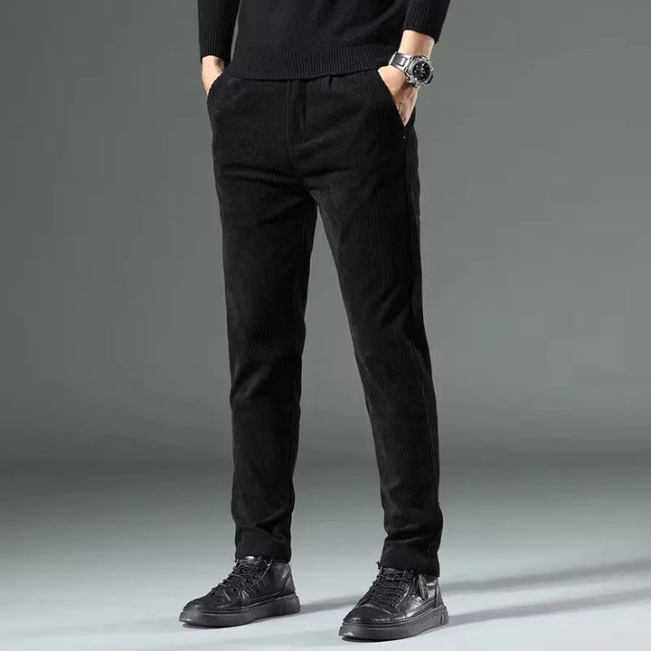Beige men's tailored trousers, offering effortless everyday style, comfort, and versatility.