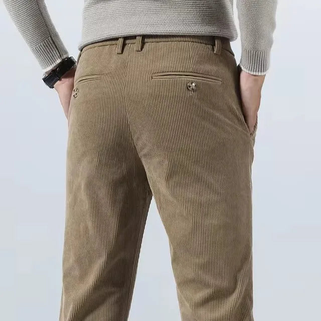 Wrinkle-resistant gray tailored dress pants for men, offering smart casual appeal and comfort.