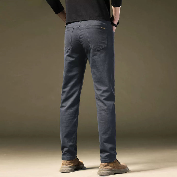 Front view of men's modern fit tailored cotton trousers in a classic color, perfect for refined style.