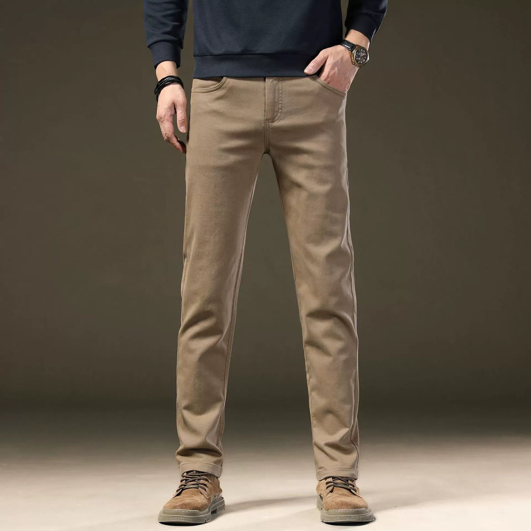 Back view of men's comfortable tailored cotton pants, showcasing refined fit and premium material.