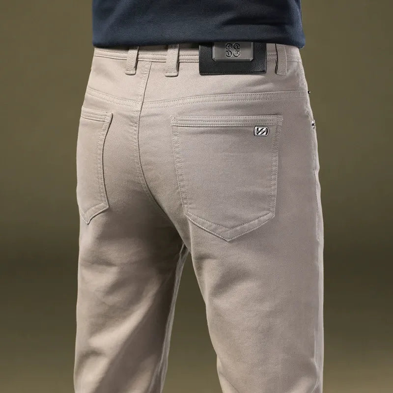Comfortable men's tailored cotton pants, offering a premium modern fit for refined smart casual style.