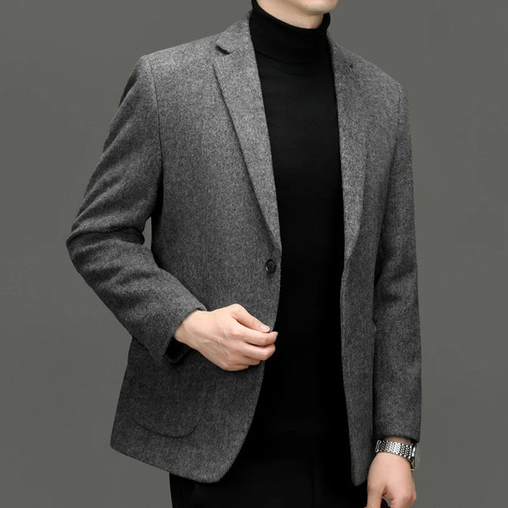Elegant men's tailored fit blazer, creating a sharp silhouette for professional fashion and sophisticated style.