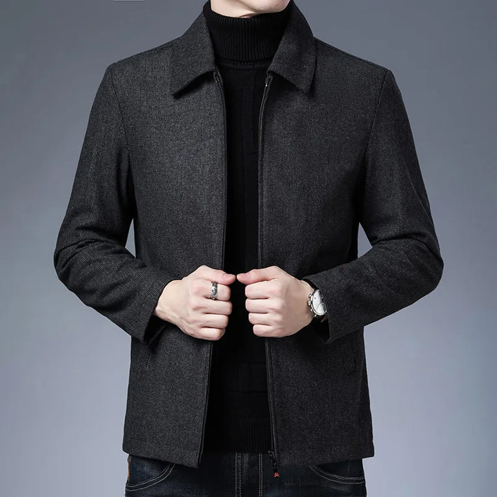 Stylish men's tailored zip jacket with a high collar, perfect for versatile casual or semi-formal wear.