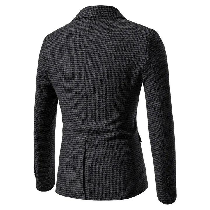 Close-up of men's sophisticated houndstooth tailored blazer. Ideal for smart casual or business attire.
