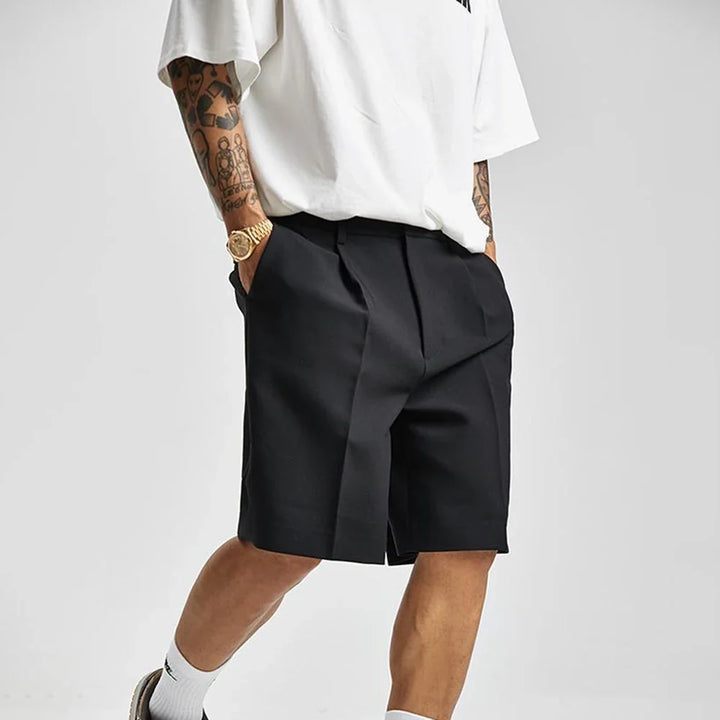 Modern fit men's tailored athletic shorts. Sleek design for everyday fashion & comfortable performance.