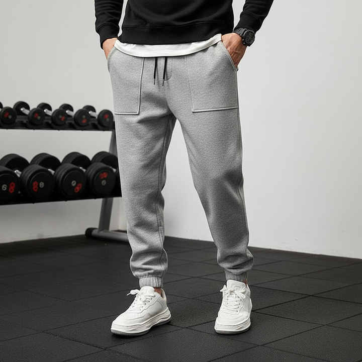 Men's Tanner athletic performance pants with elastic waist. Ideal for workouts, training, and casual wear.