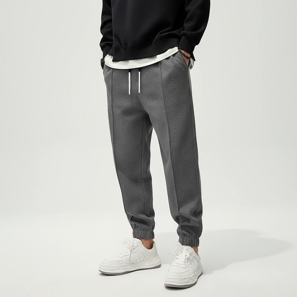 Tanner men's performance joggers with elastic waist. Versatile activewear for sports, workouts, and leisure.