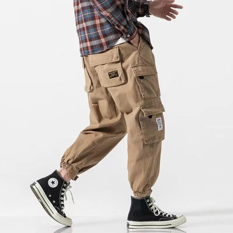 Men's tapered cargo pants with elastic cuffs, perfect for casual wear & comfort.