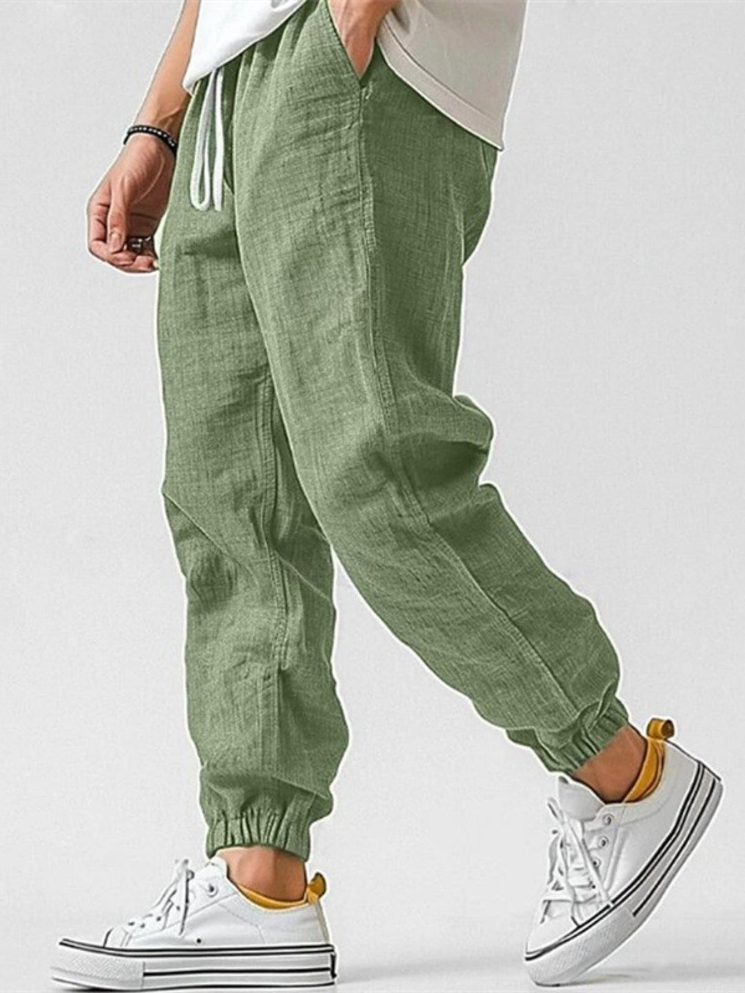 Comfortable men's relaxed fit joggers featuring tapered legs & cuffed hems for stylish everyday wear.