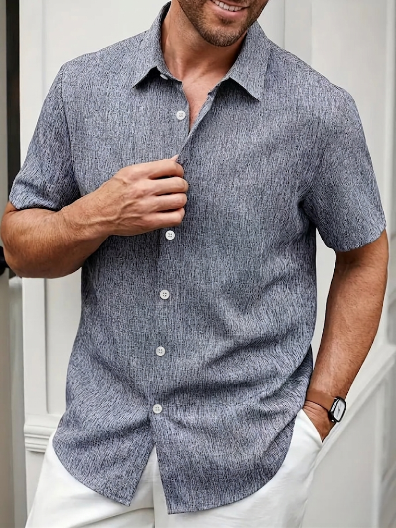 Versatile men's regular fit textured polo shirt, short sleeve, button-down collared. Great for smart casual wear.