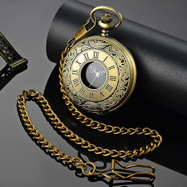 Close-up of men's vintage quartz pocket watch, showcasing intricate details & attached chain.