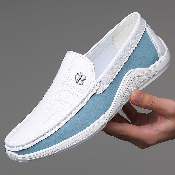 Premium men's two-tone slip-on shoes, offering both comfort and fashion style.