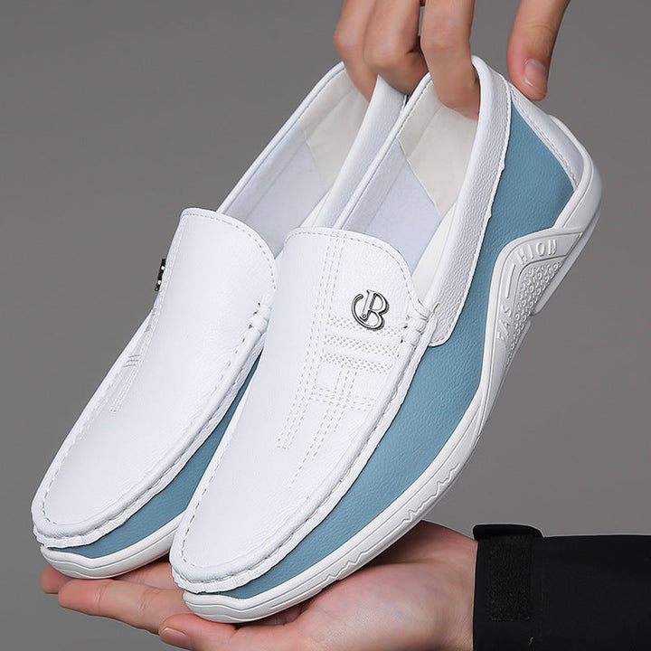 Men's two-tone loafers, a timeless slip-on style for the modern man's wardrobe.