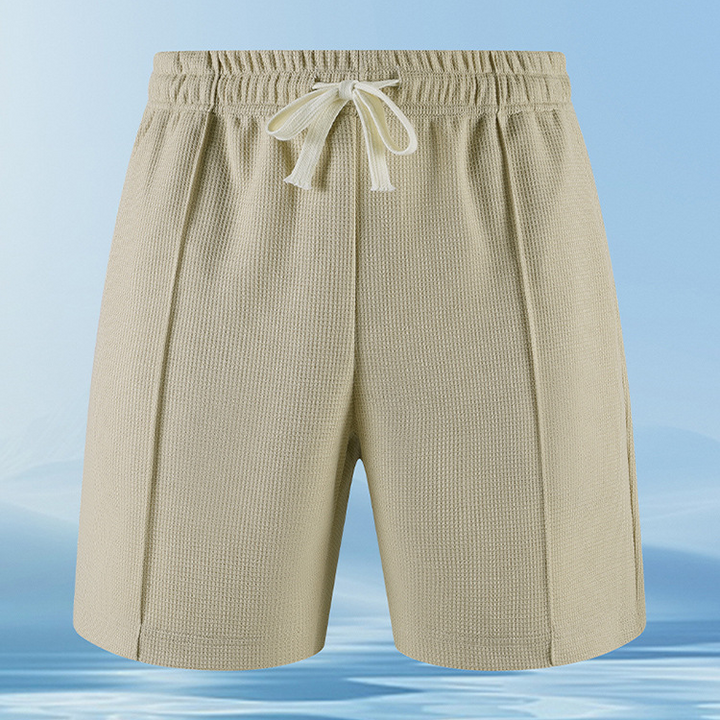 Close-up of the textured Piqué fabric in a men's ultra-comfort lounge set, highlighting breathability.