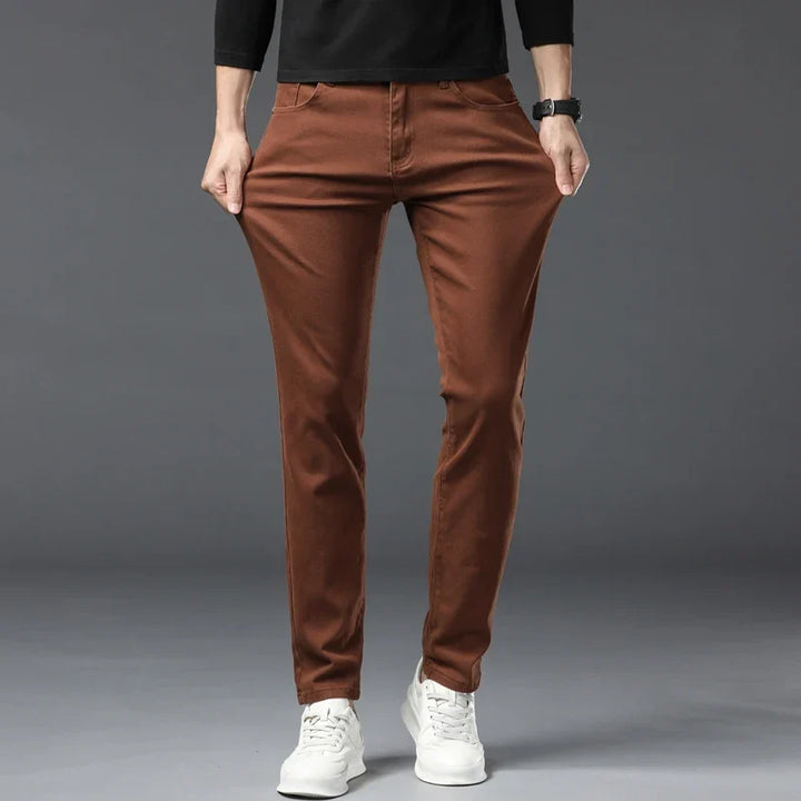 Man wearing comfortable stretch denim jeans, ideal for active casual wear & flexible movement.