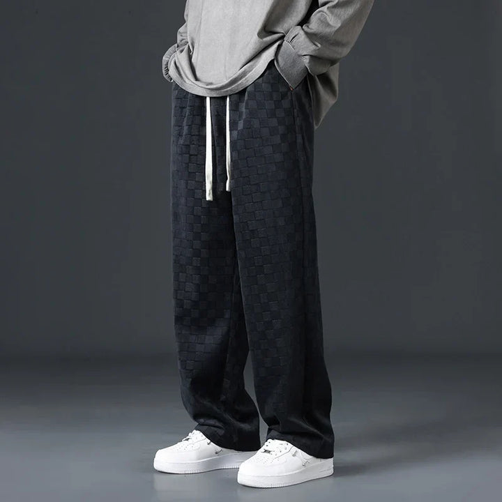 Black men's comfortable sweatpants, offering ultimate relaxed fit for lounge wear, casual outings & style.