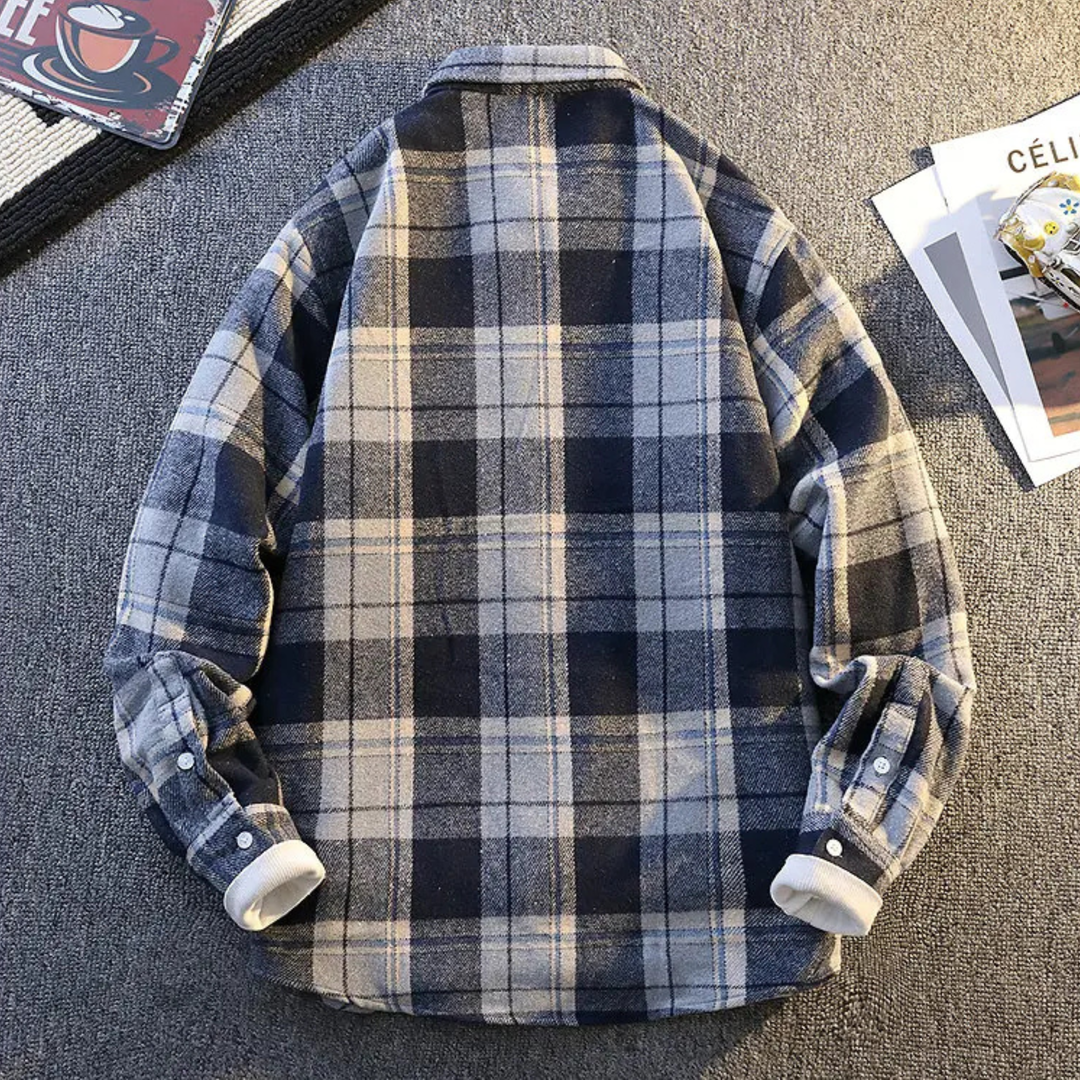 Men's casual plaid button-up shirt with rolled sleeves, showing comfort & versatile style.