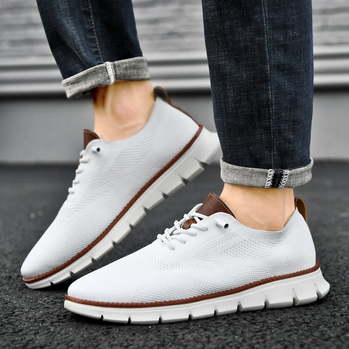White UrbanFlex men's comfort sneakers, lightweight design for versatile wear.