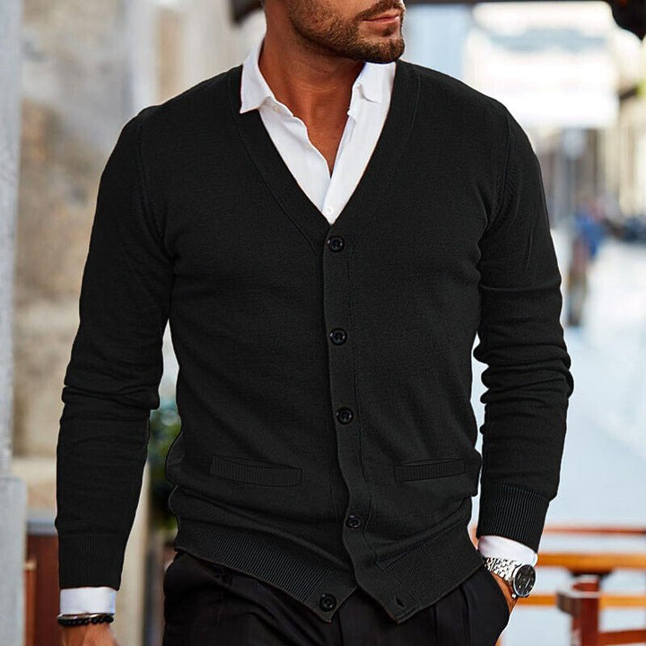 Soft knitwear fabric of a men's long sleeve V-neck button cardigan, a comfortable fall/winter layering top.