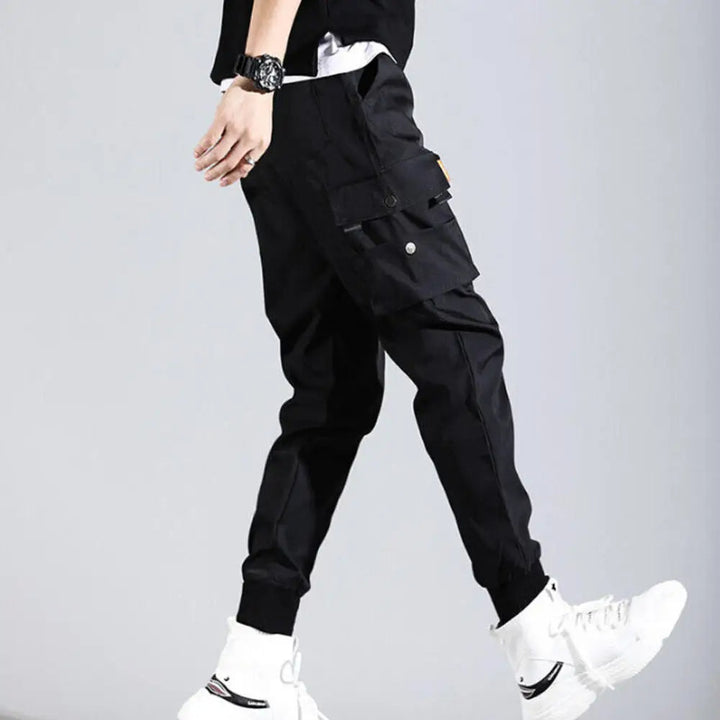 Tapered fit men's storm gray cargo joggers. Versatile for casual wear or athletic activities.