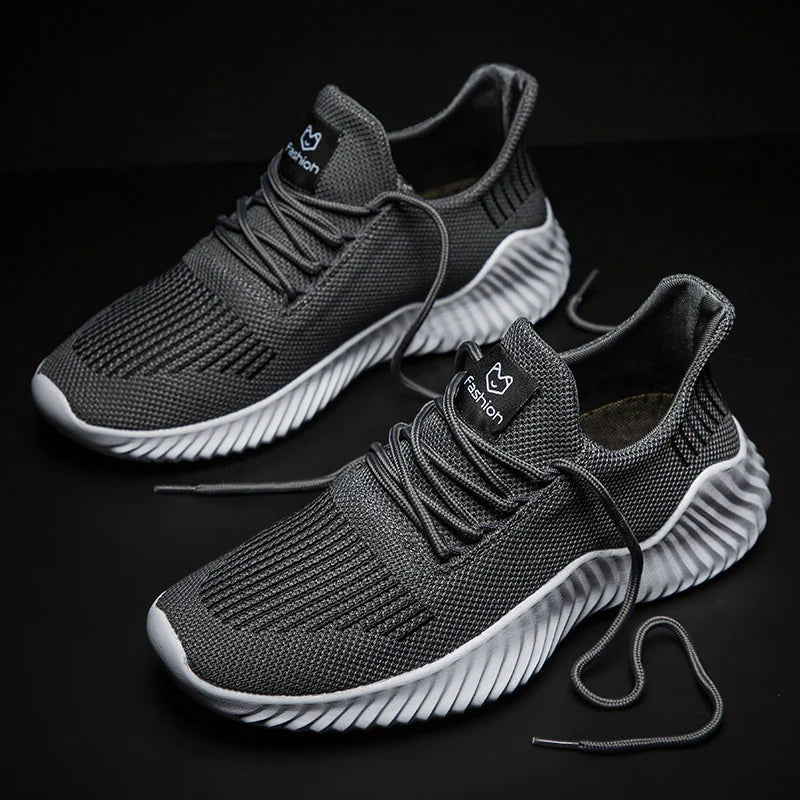 Supportive Men's Velocity performance trainers, ensuring a secure & comfortable stride.