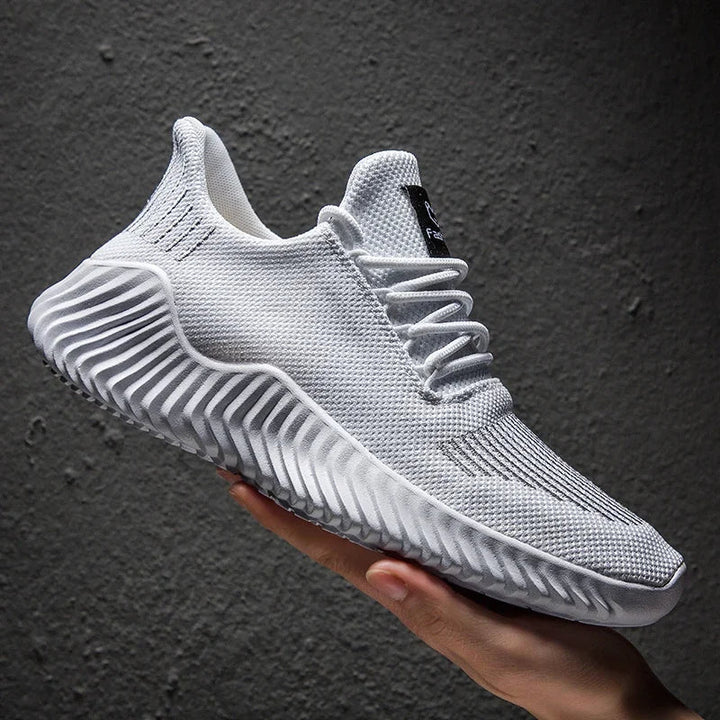 Lightweight Men's Velocity performance trainers, ultimate comfort for workouts.