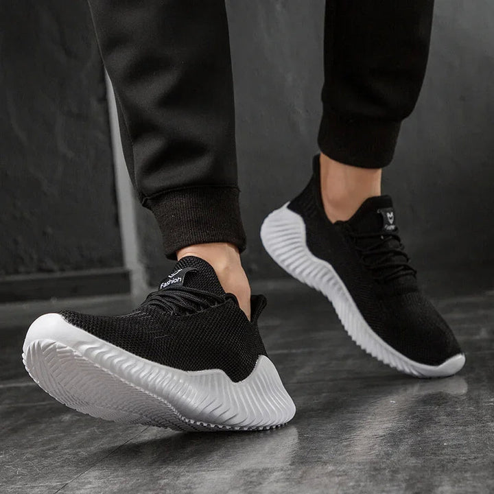 Easy slip-on Men's Velocity trainers, combining convenience with performance tech.