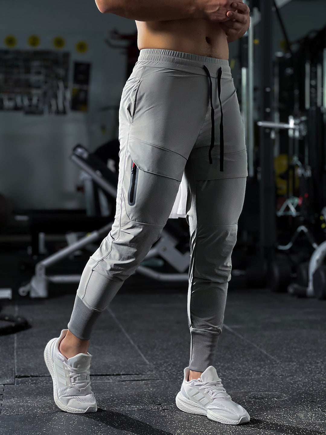 Man in men's performance cargo joggers, active pose, showing activewear versatility.