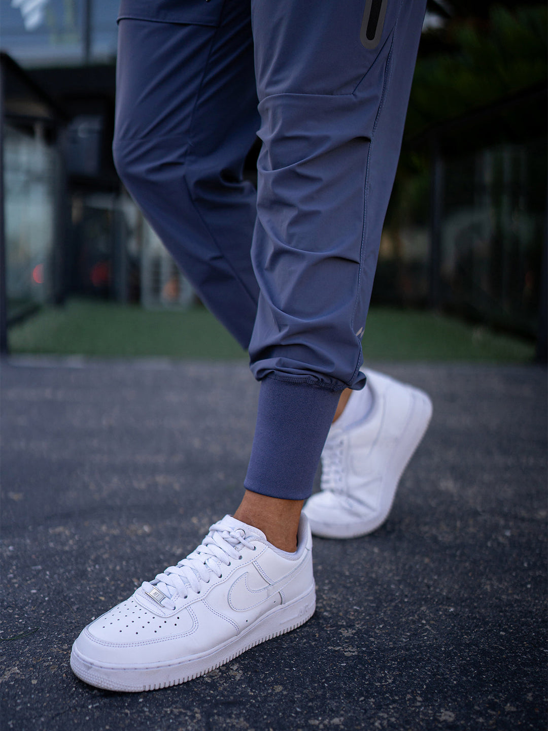 Full-length view of men's versatile cargo joggers, showcasing tapered fit & sleek design.