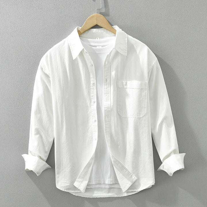 Classic men's long-sleeve button-down shirt with a relaxed fit for daily wear.