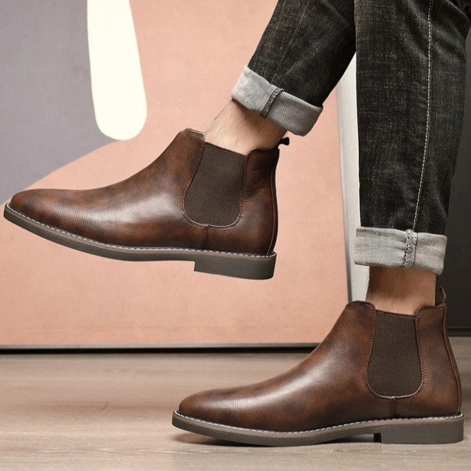 Men's modern dress boots, slip-on Chelsea design for sleek and comfortable footwear.
