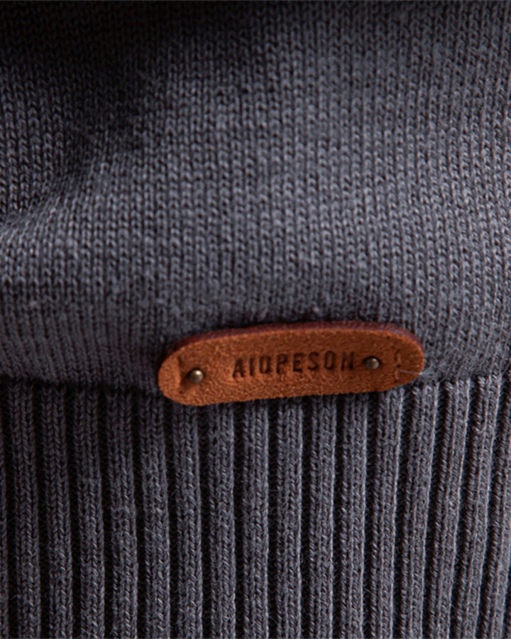 Versatile men's crew neck with intricate textured knit, great for layering.