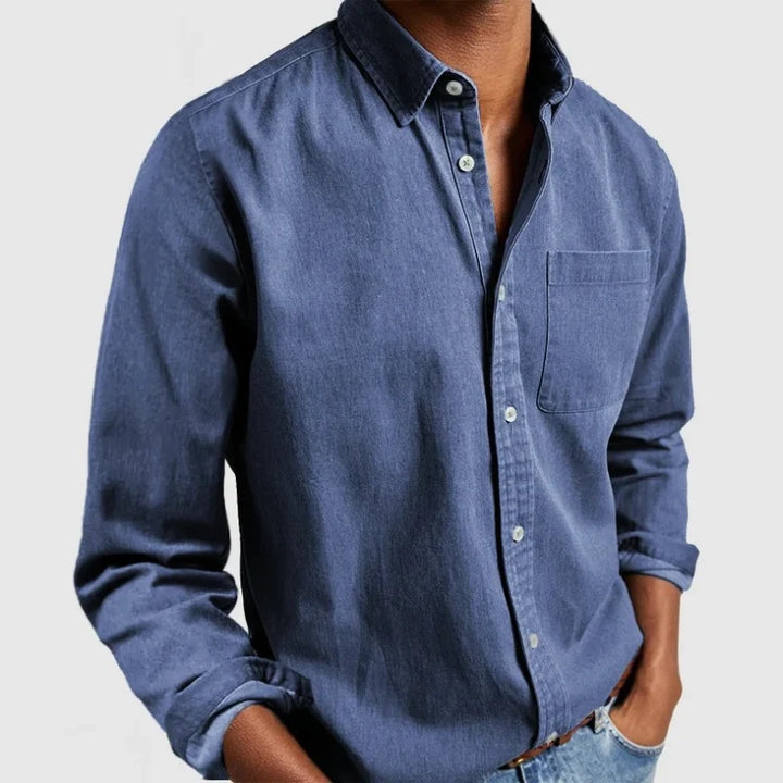 Relaxed fit men's long sleeve chambray shirt, vintage button-up style, great for casual everyday fashion.