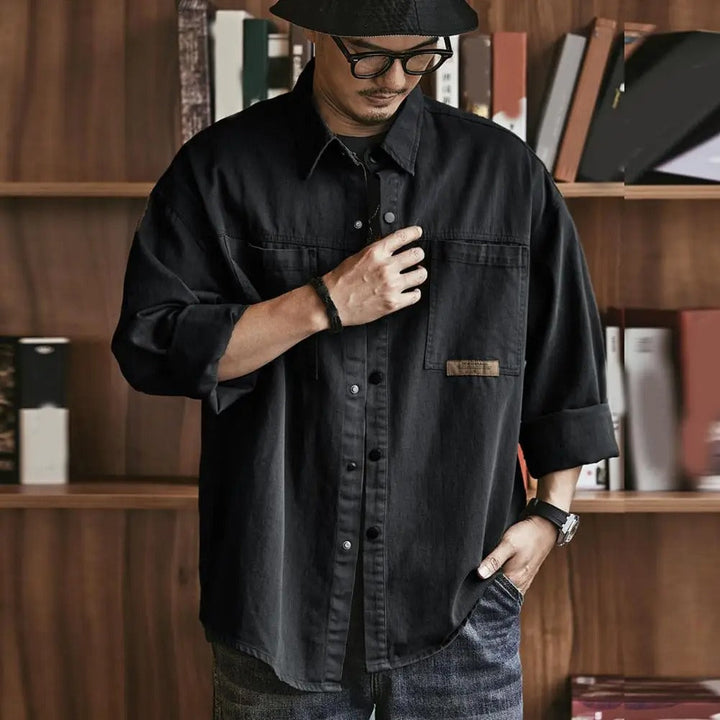 Casual men's vintage button-up shirt, long sleeve, cotton blend, a retro fashion essential.