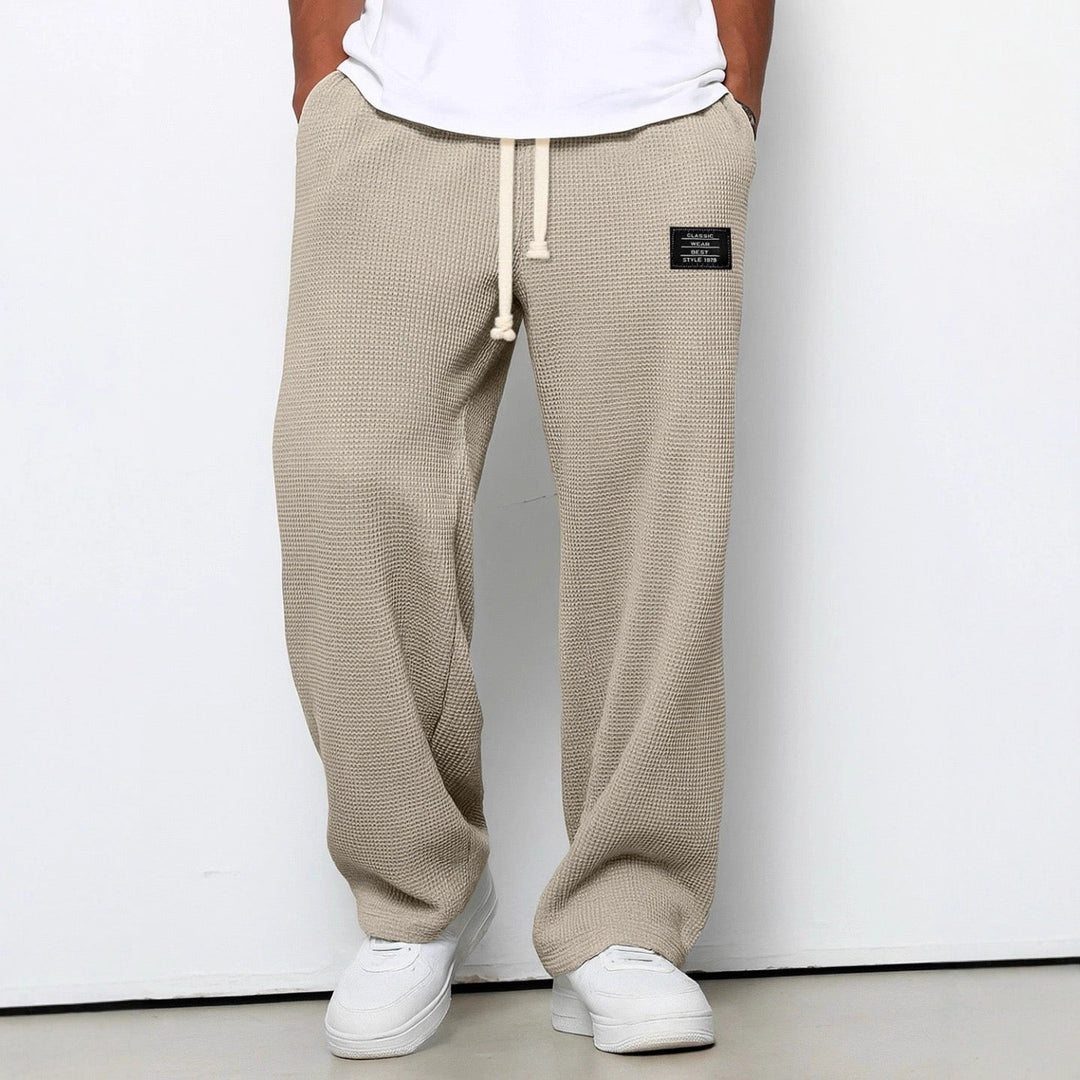 Soft waffle knit men's trousers, ideal for comfort wear and a stylish casual look.