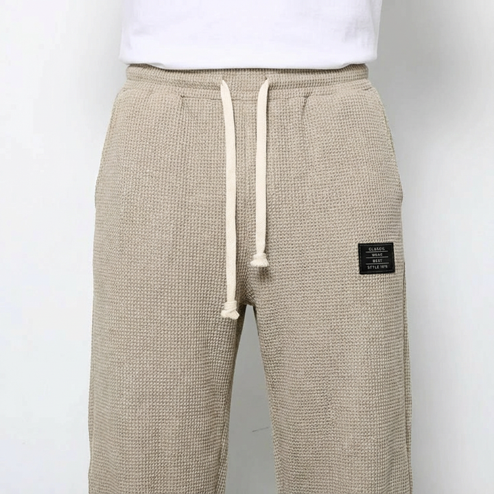 Men's drawstring waffle knit pants, featuring a perfect relaxed fit and a casual bottom design.