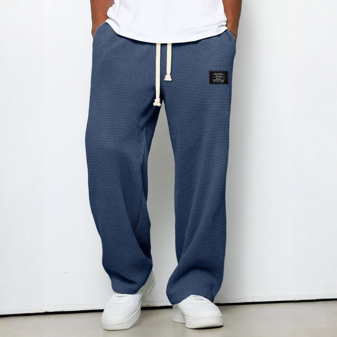 Modern men's fashion waffle knit comfort trousers, perfect relaxed fit loungewear for any man.