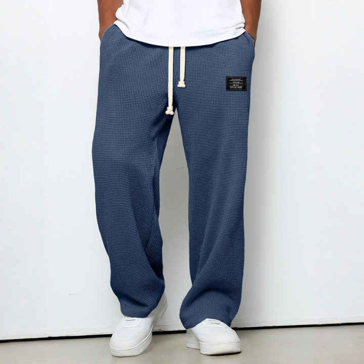 Modern men's fashion waffle knit comfort trousers, perfect relaxed fit loungewear for any man.