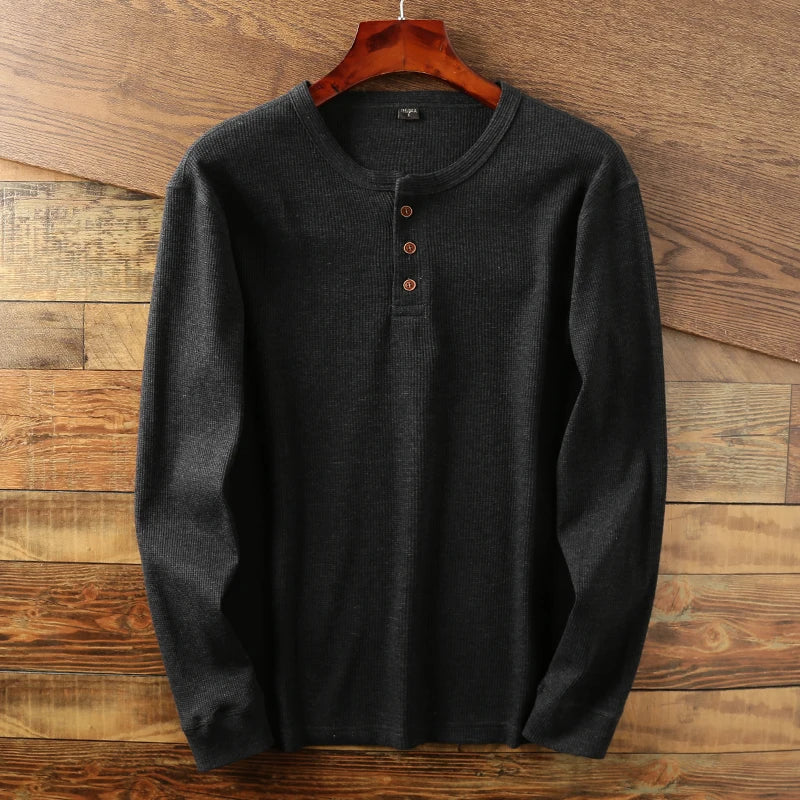 Classic men's waffle knit long sleeve shirt, a modern staple for casual everyday wear & layering.