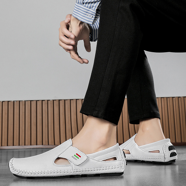 Easy slip-on men's everyday walking sandals with an adjustable comfort strap.